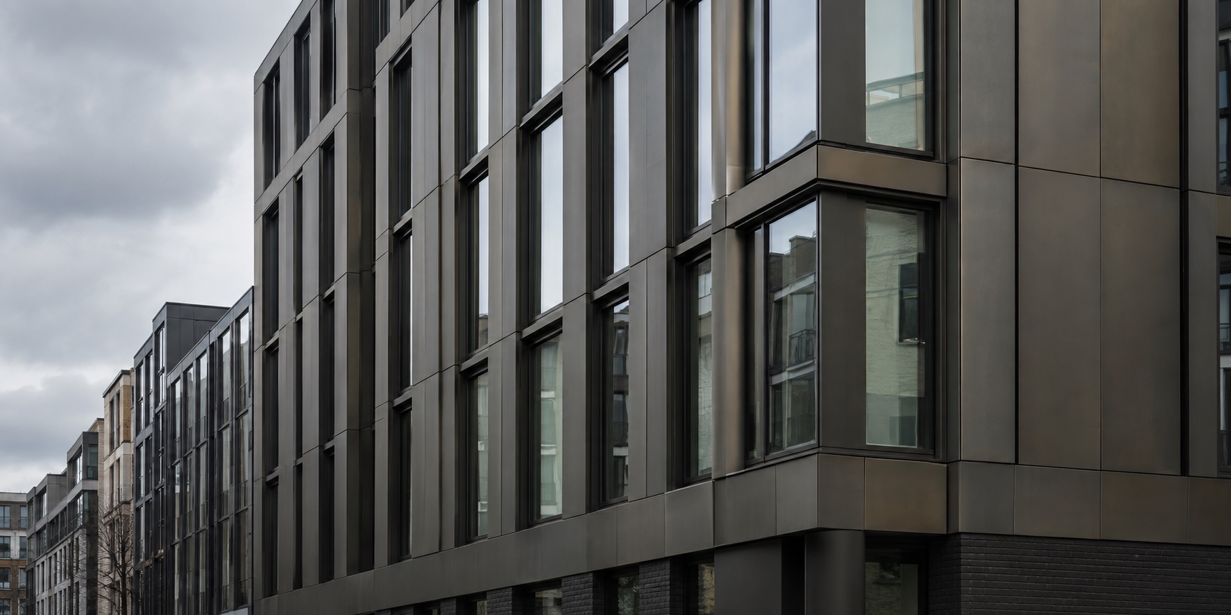 Contemporary rainscreen-clad building illustrating façade geometry